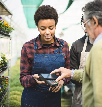 business owner using a pos system